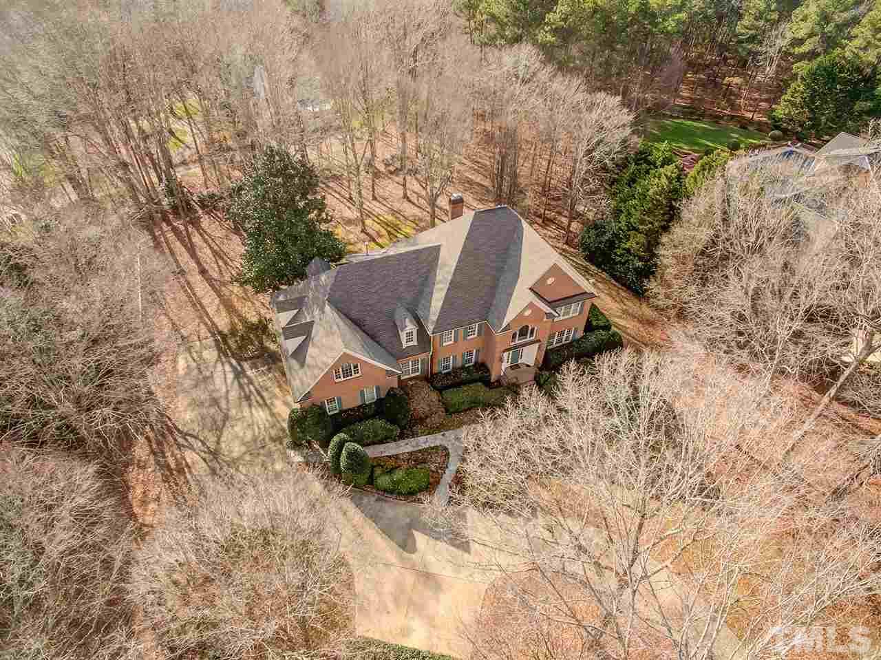Drone photo shows the private wooded 1.8 acre lot