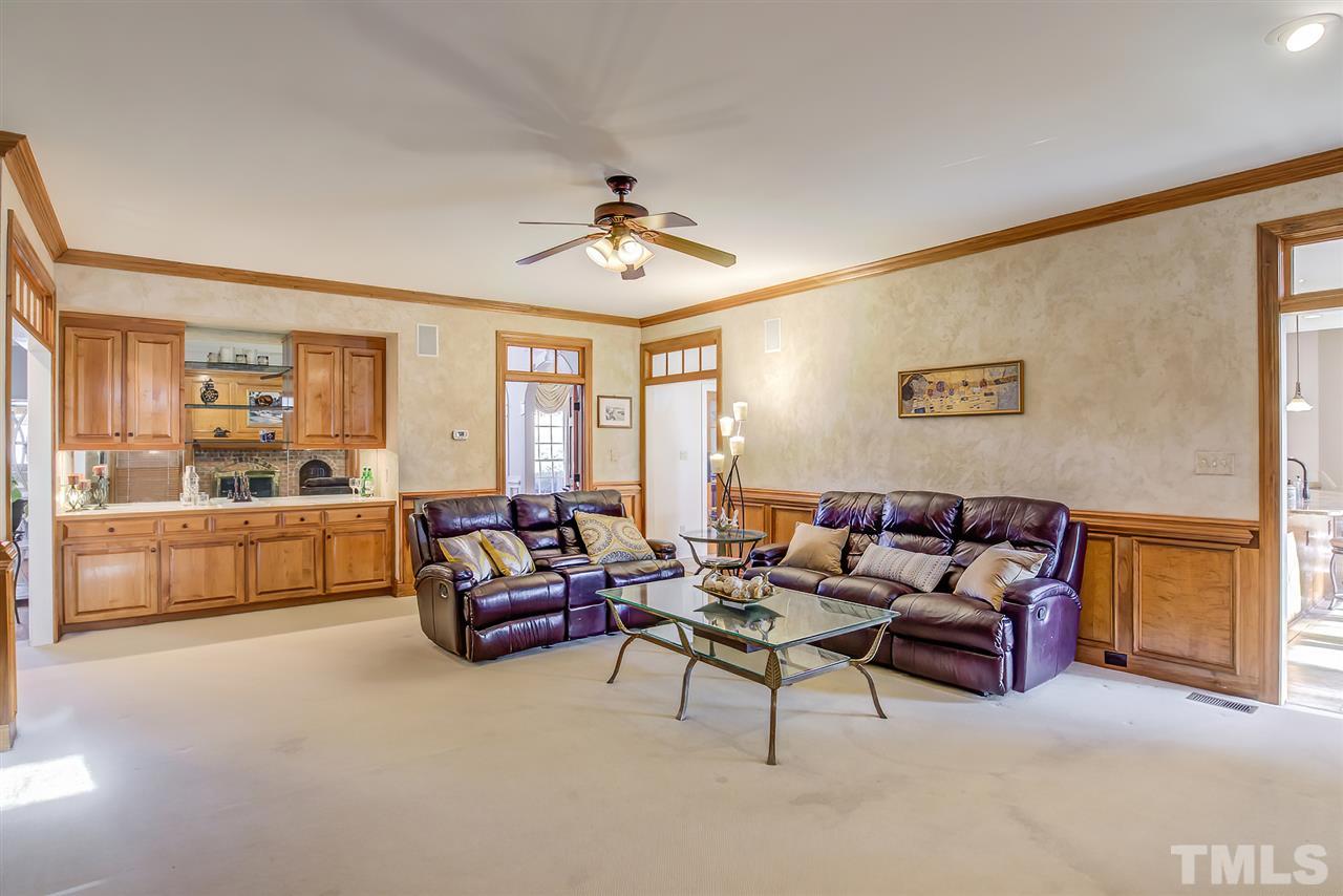12129 Lockhart Lane Raleigh, NC 27614 - Photo 12 of 30 Large yet cozy family room with fireplace and wet bar.