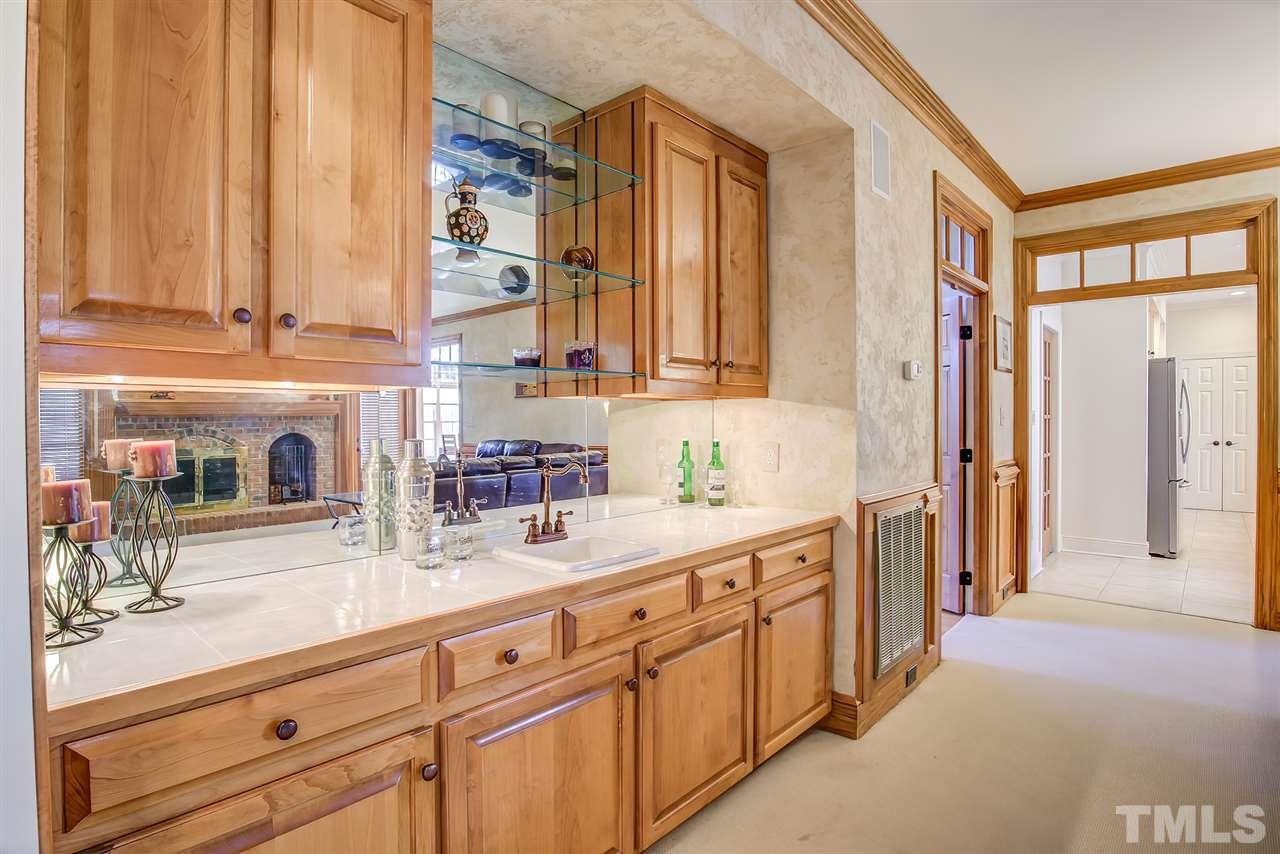 12129 Lockhart Lane Raleigh, NC 27614 - Photo 13 of 30 Entertain in style with this wet bar in the family room.
