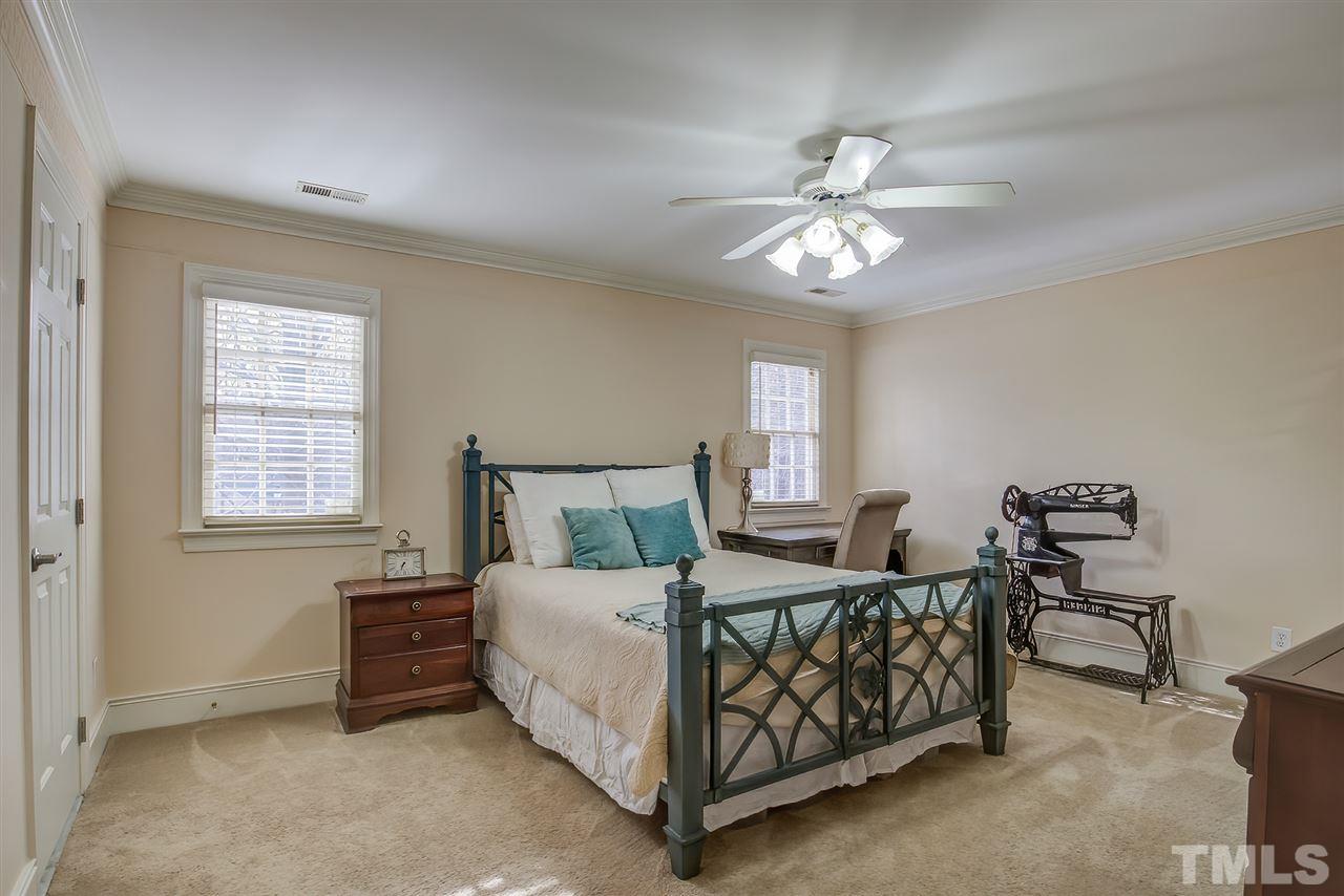 12129 Lockhart Lane Raleigh, NC 27614 - Photo 19 of 30 Guest room on the second floor with a private bath and walk in closet.