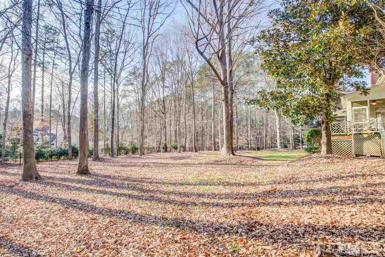 12129 Lockhart Lane Raleigh, NC 27614 - Photo 30 of 30 Gorgeous flat partially wooded lot with metal fence in the backyard.