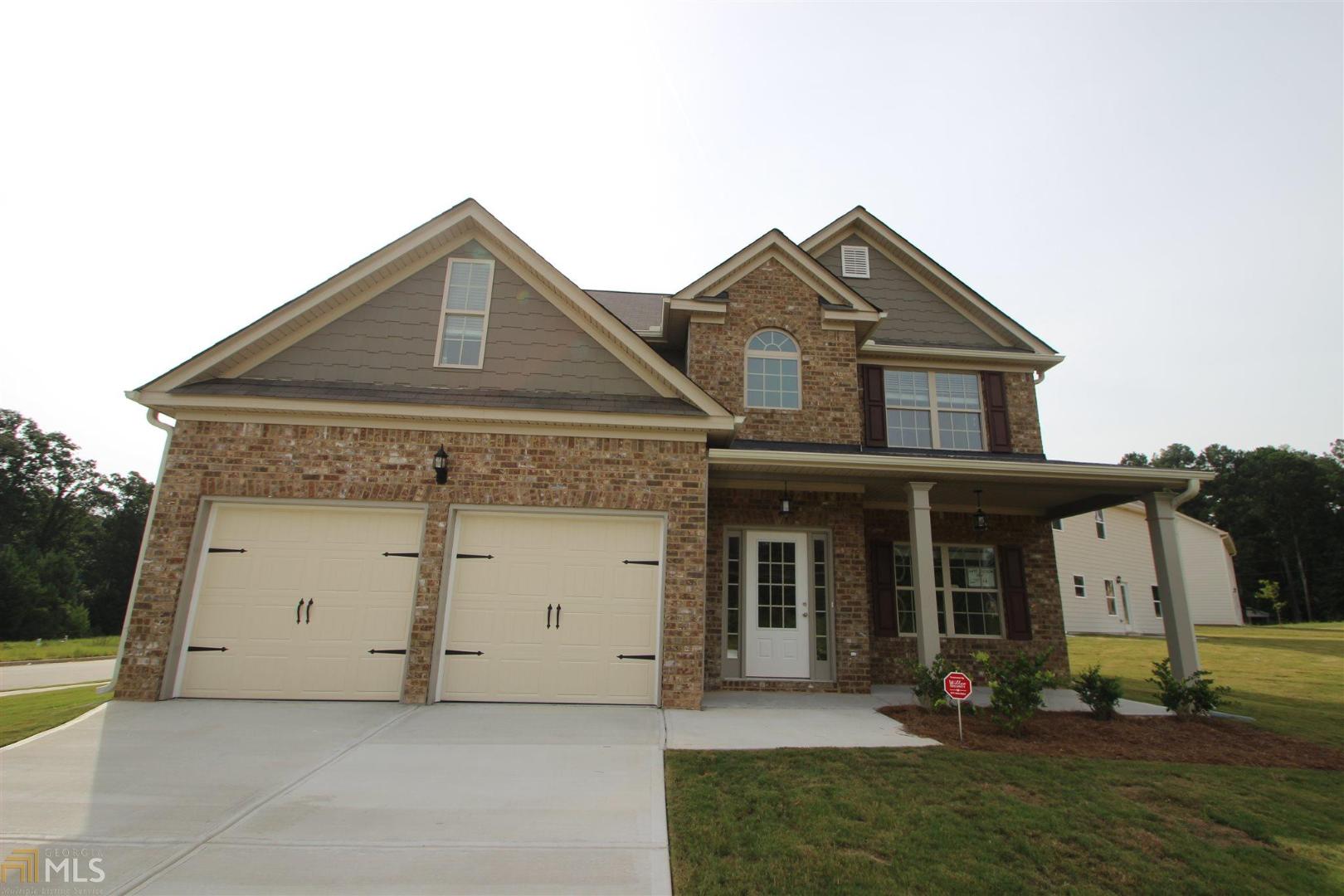 3477 Hancock View, Unit 46 Decatur, GA 30034 - Photo 1 of 1 a front view of a house with garden