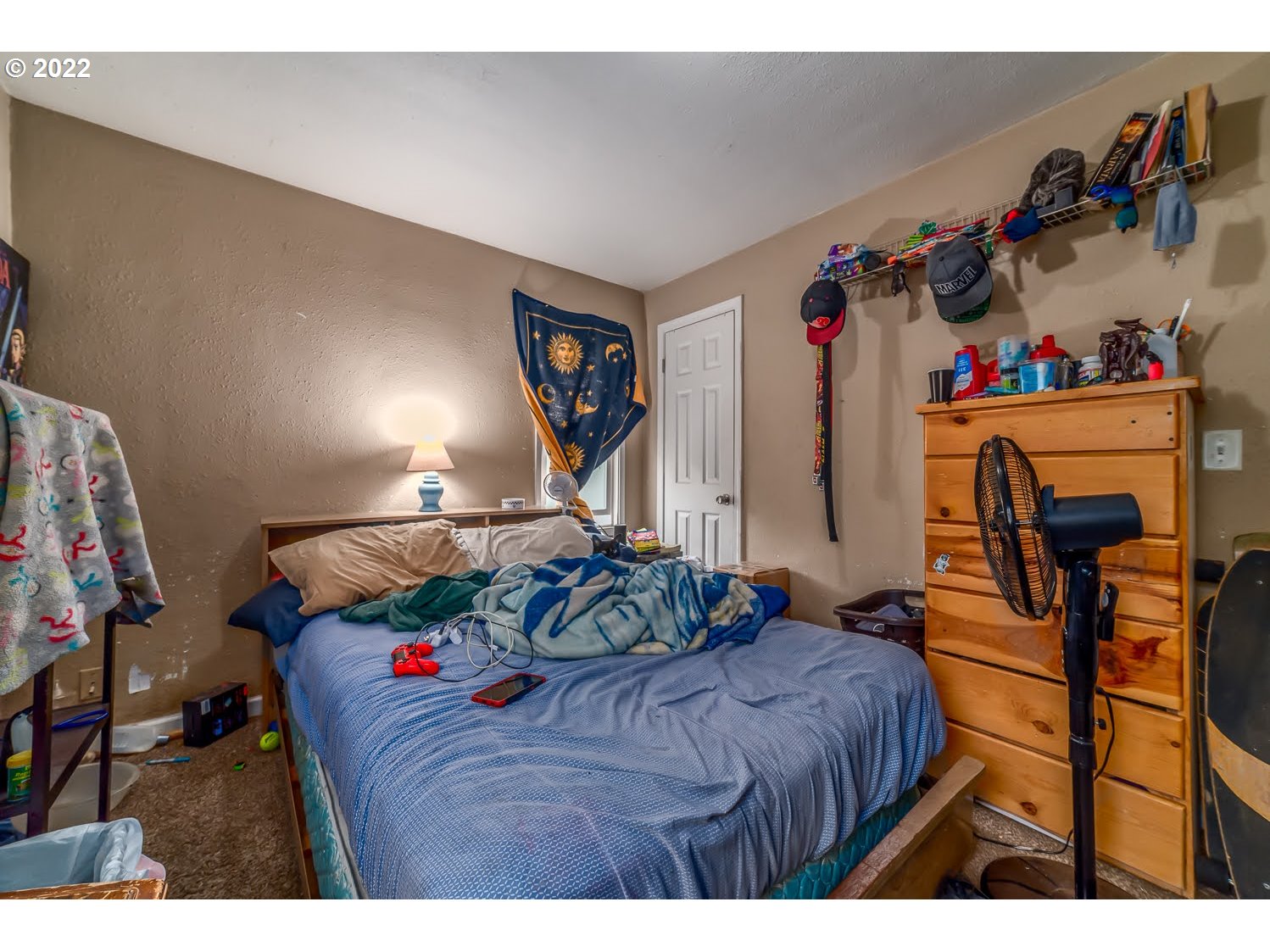 1409 Parker Street Springfield, OR 97477 - Photo 12 of 19 a bedroom with a bed and a closet