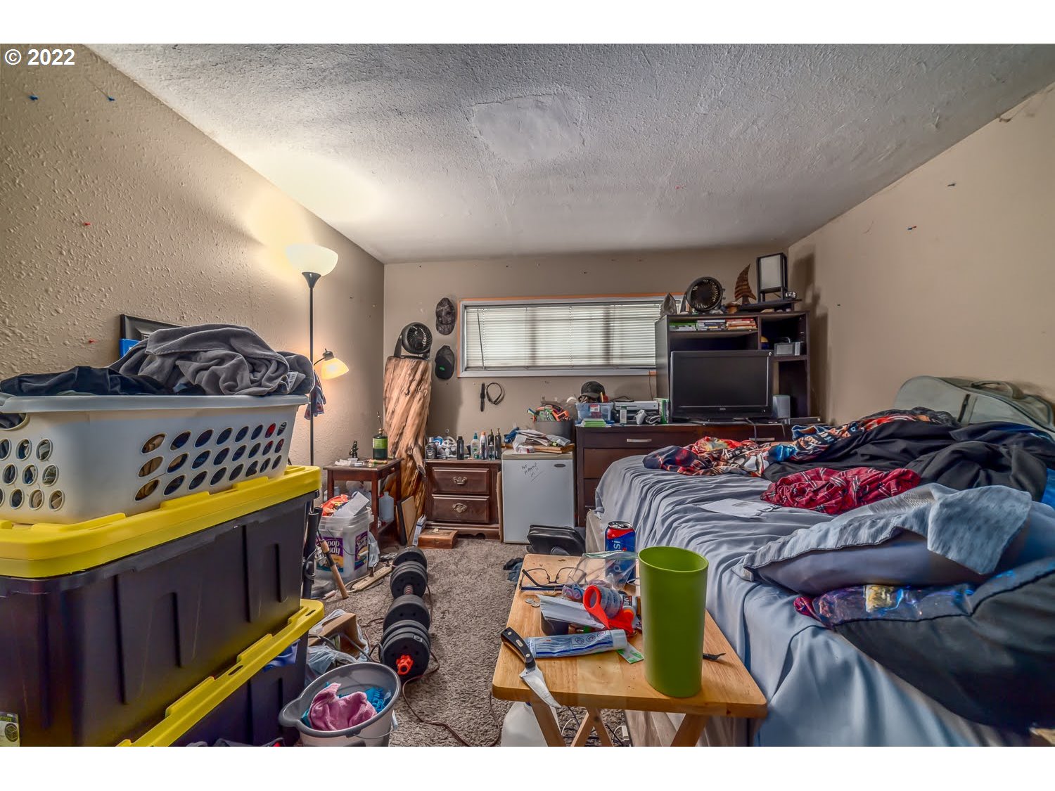 1409 Parker Street Springfield, OR 97477 - Photo 13 of 19 a bed room with furniture and a flat screen tv