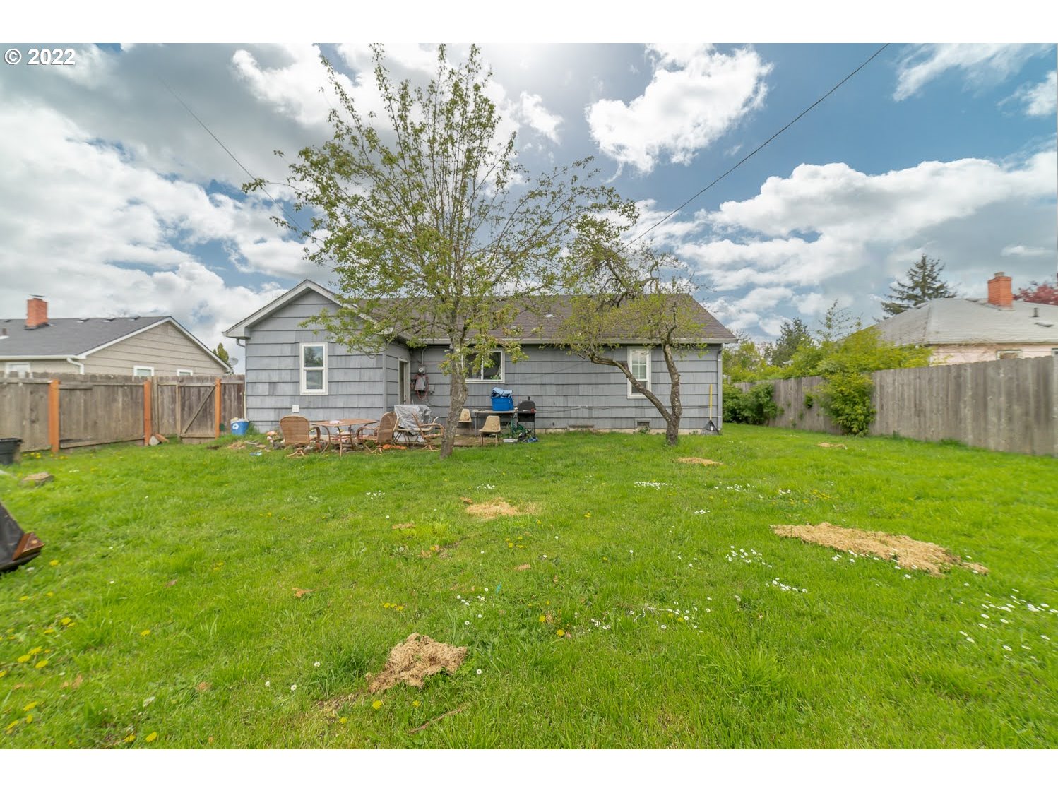 1409 Parker Street Springfield, OR 97477 - Photo 19 of 19 a view of a house with a big yard