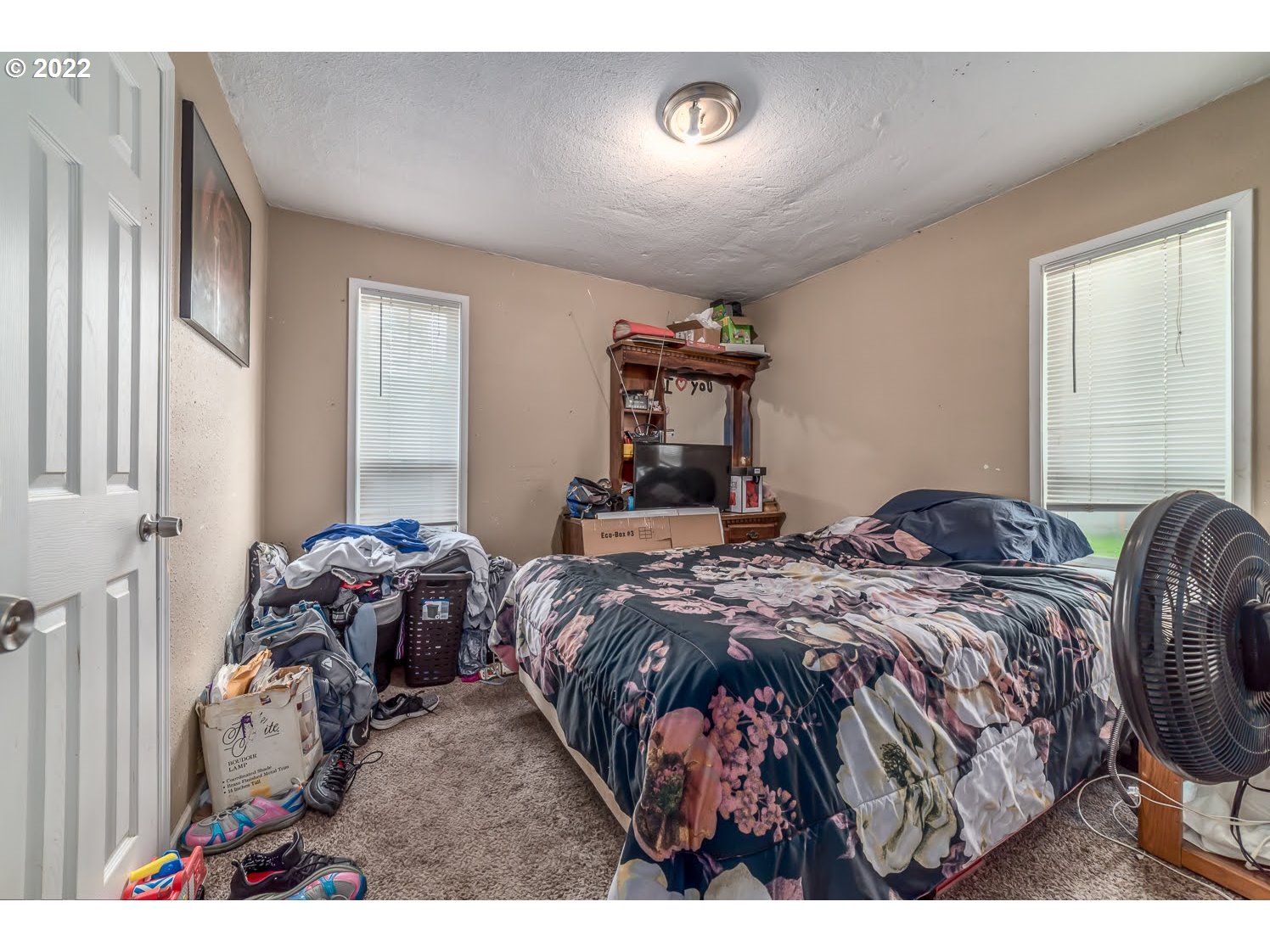 1409 Parker Street Springfield, OR 97477 - Photo 9 of 19 a bedroom with bed and a window