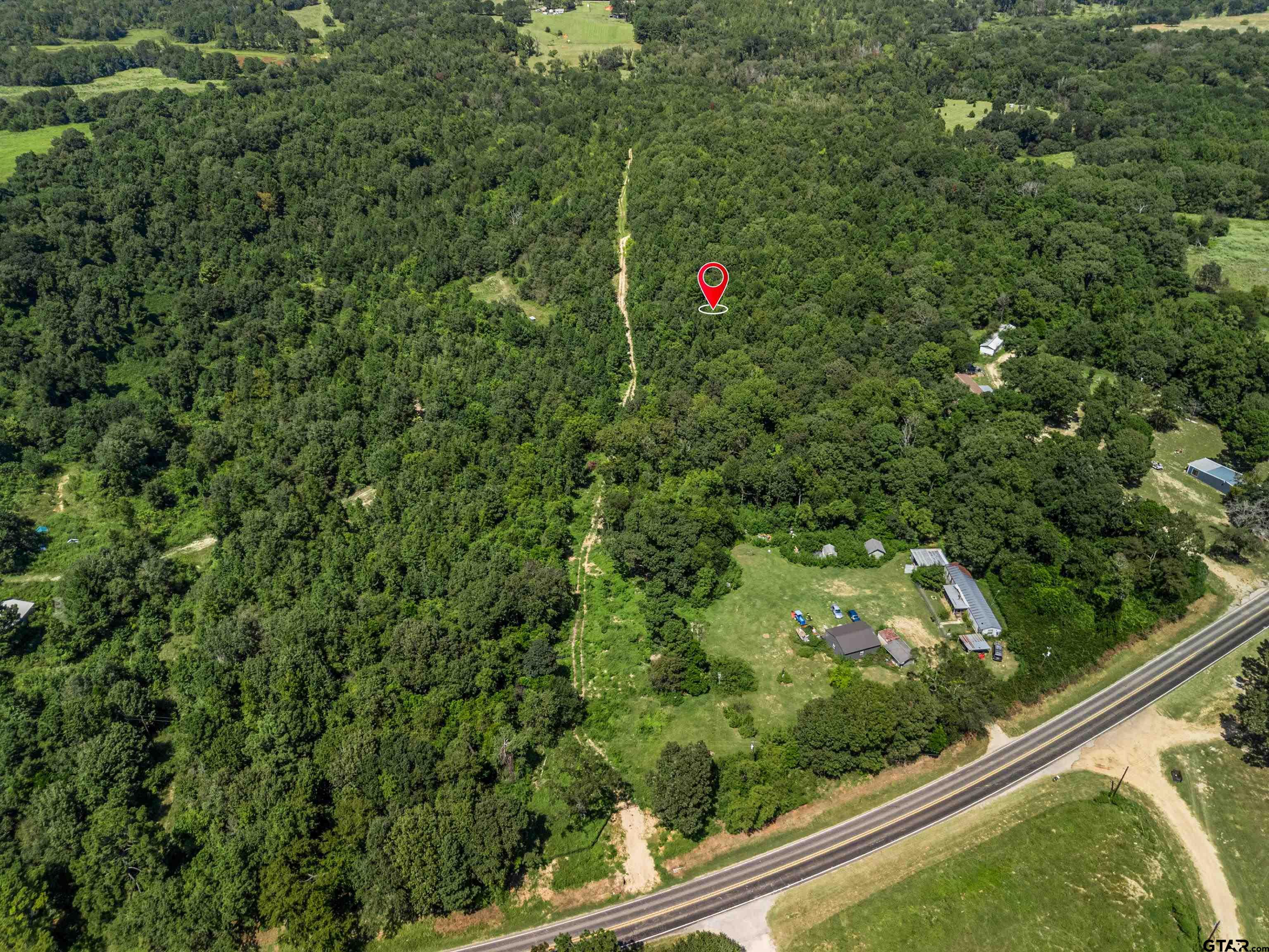 12417 Farm To Market Road 2767 Tyler, TX 75708 - Photo 3 of 16 a view of a with large trees