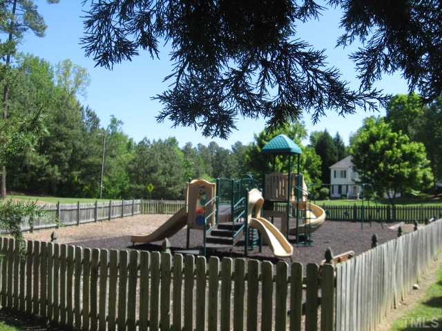 2612 Diamondhitch Trail Raleigh, NC 27615 - Photo 24 of 25 The neighborhood has a fenced playground right next to the swimming pool and tennis courts. How cute is this!