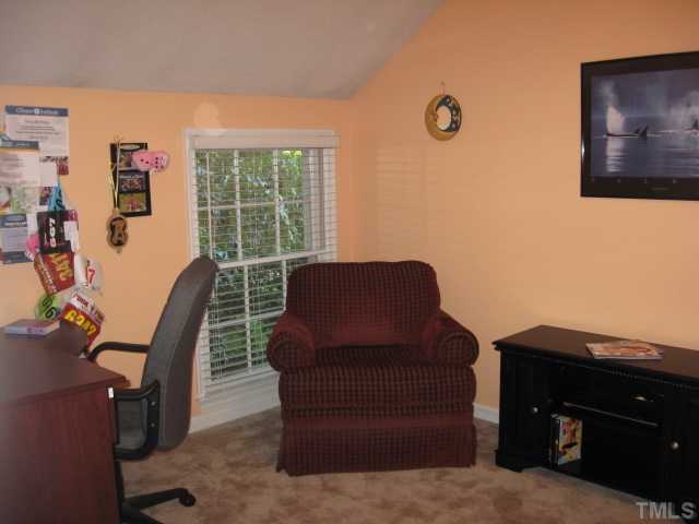 2612 Diamondhitch Trail Raleigh, NC 27615 - Photo 10 of 25 The second Bedroom is currently working as a home office & relaxation room. Each bedroom has a good sized closet with built in shelving and a ceiling fan. This Bedroom also has a window with a view of the yard. This room would make an ideal nursery.