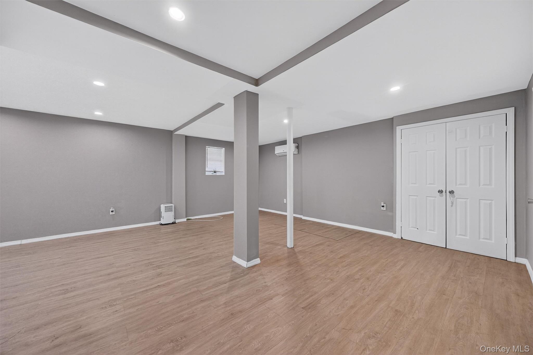 12 3rd Street Milton, NY 12547 - Photo 22 of 34 a view of an empty room with wooden floor