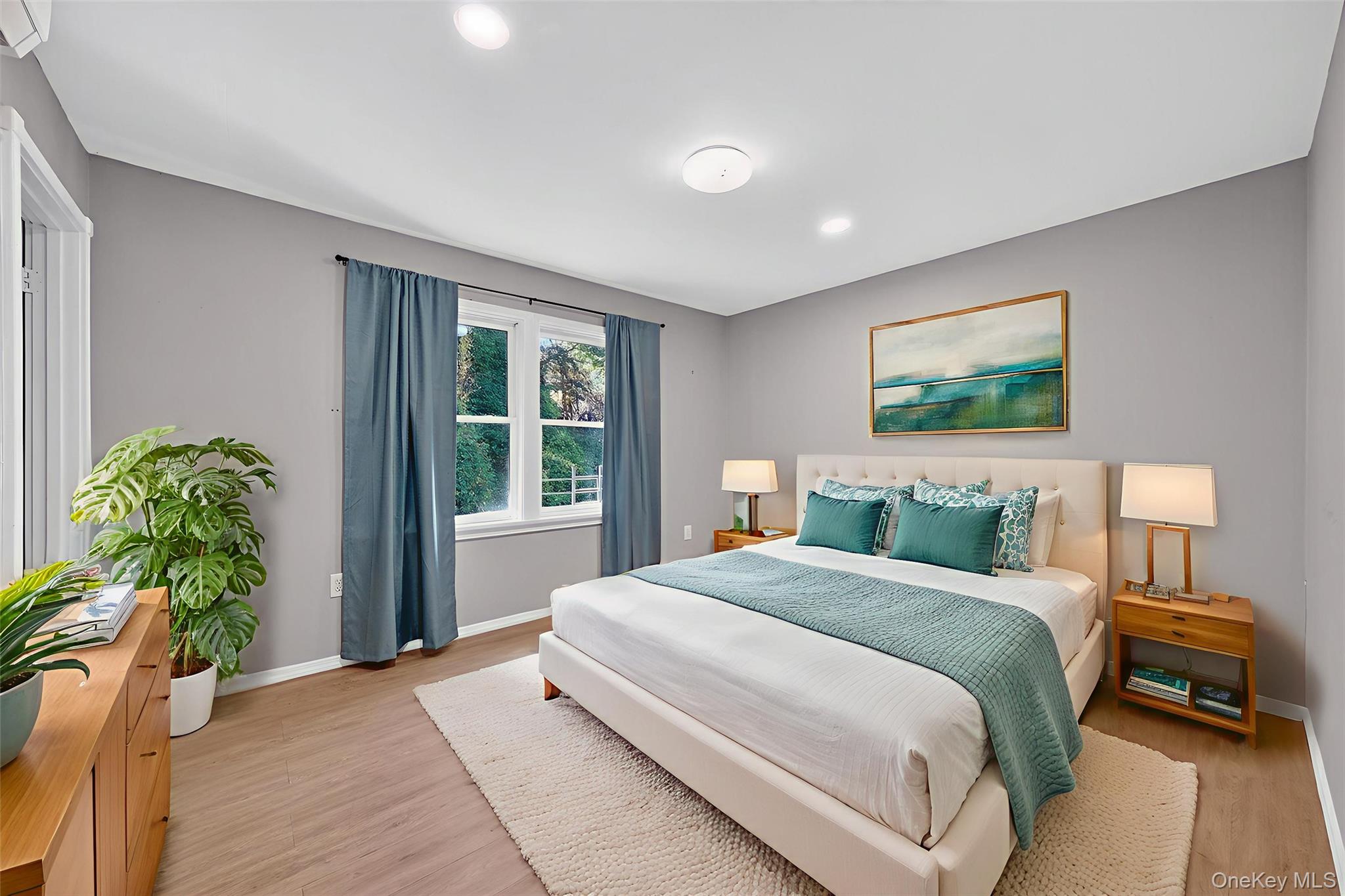 12 3rd Street Milton, NY 12547 - Photo 5 of 34 a spacious bedroom with a bed and a large window