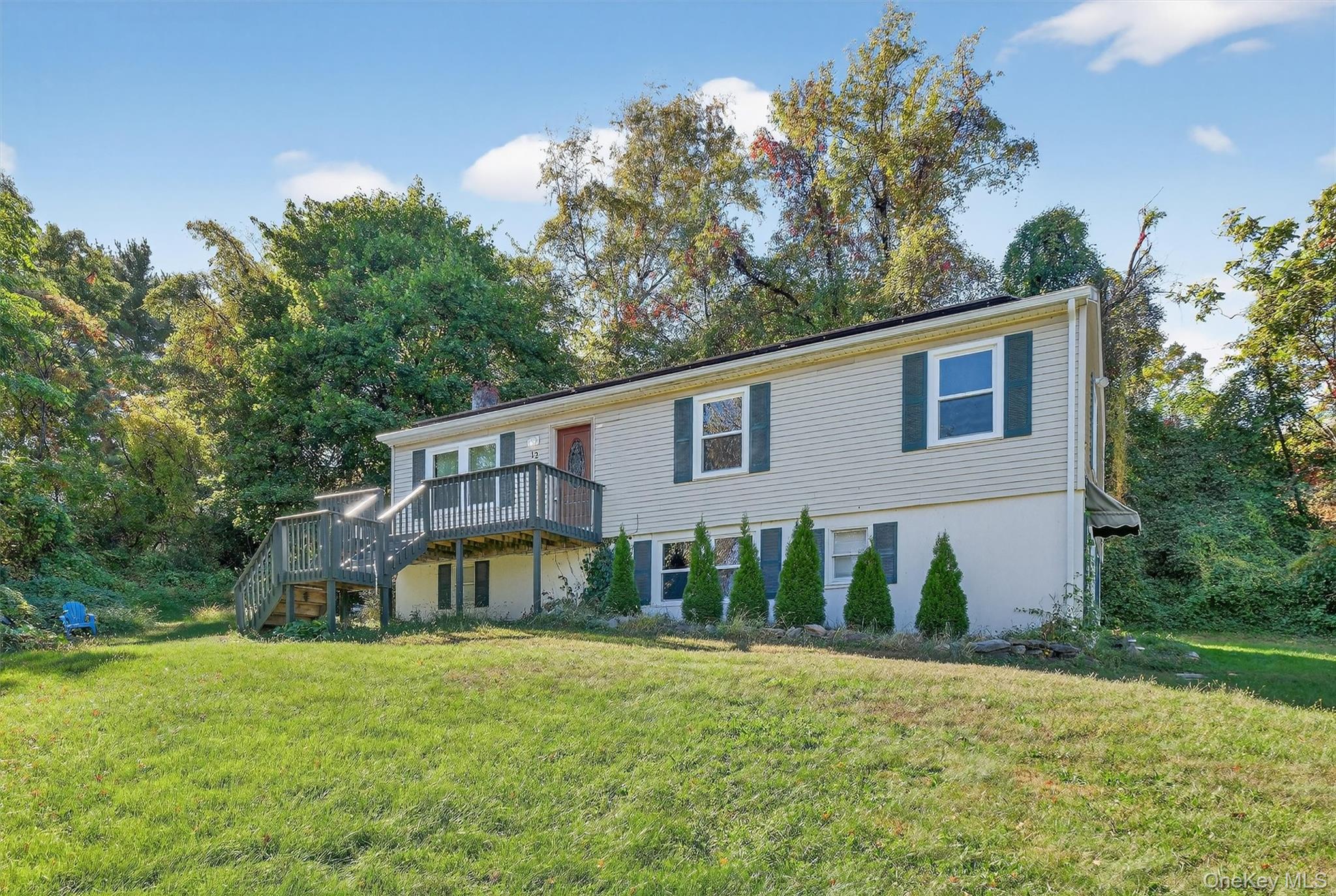 12 3rd Street Milton, NY 12547 - Photo 7 of 34 a front view of a house with a yard