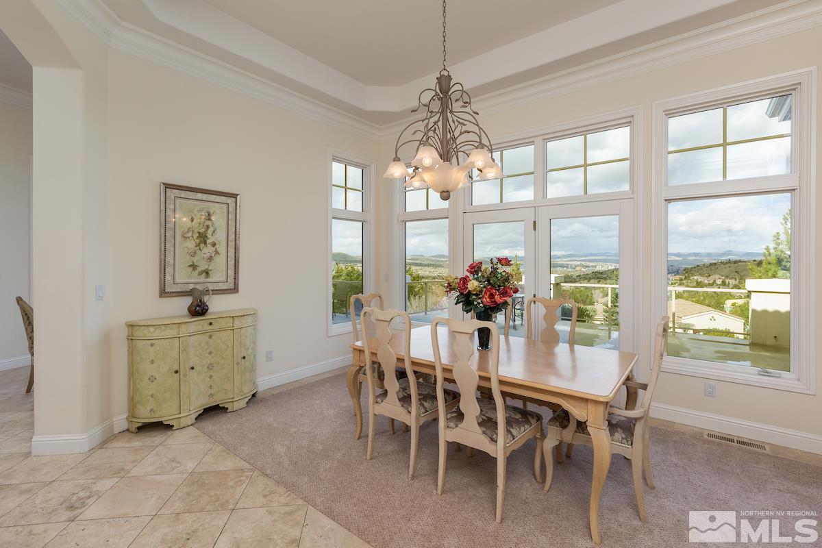 125 Hawken Road Reno, NV 89519 - Photo 6 of 25 a view of a dining room with furniture window and outside view