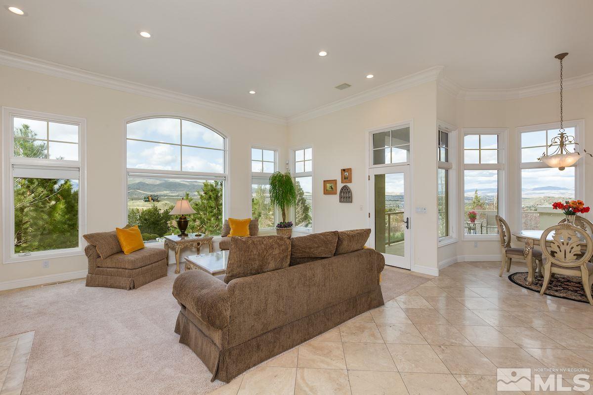 125 Hawken Road Reno, NV 89519 - Photo 9 of 25 a living room with furniture and a large window