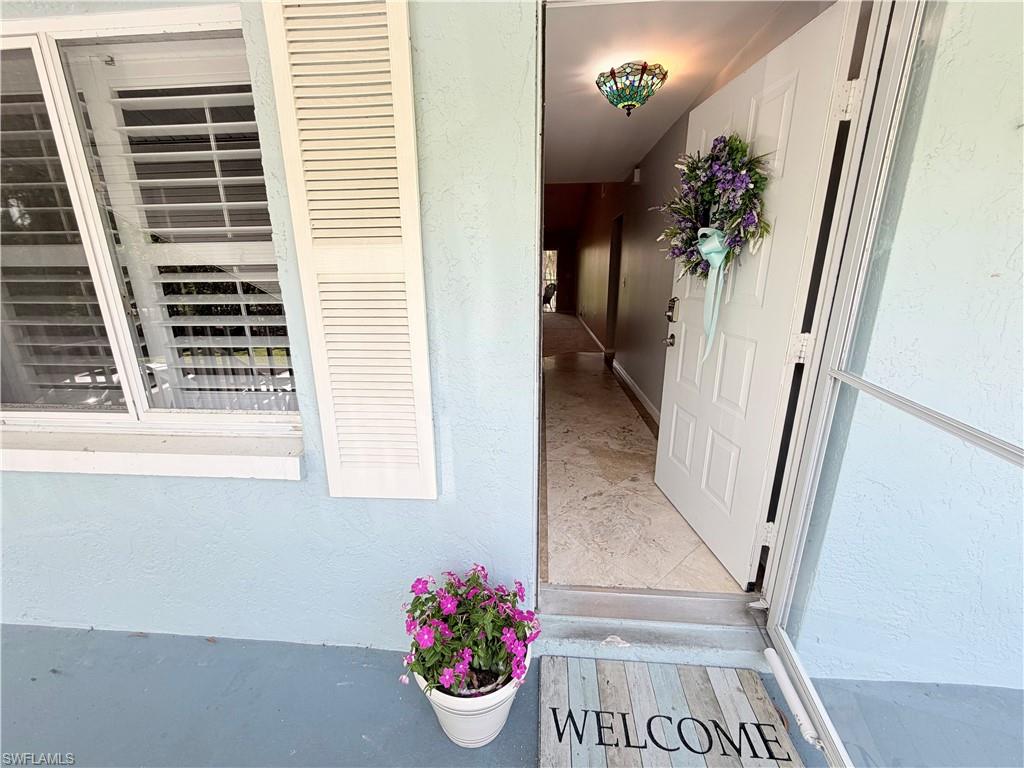 5685 Whitaker Road, Unit 202 Naples, FL 34112 - Photo 2 of 26