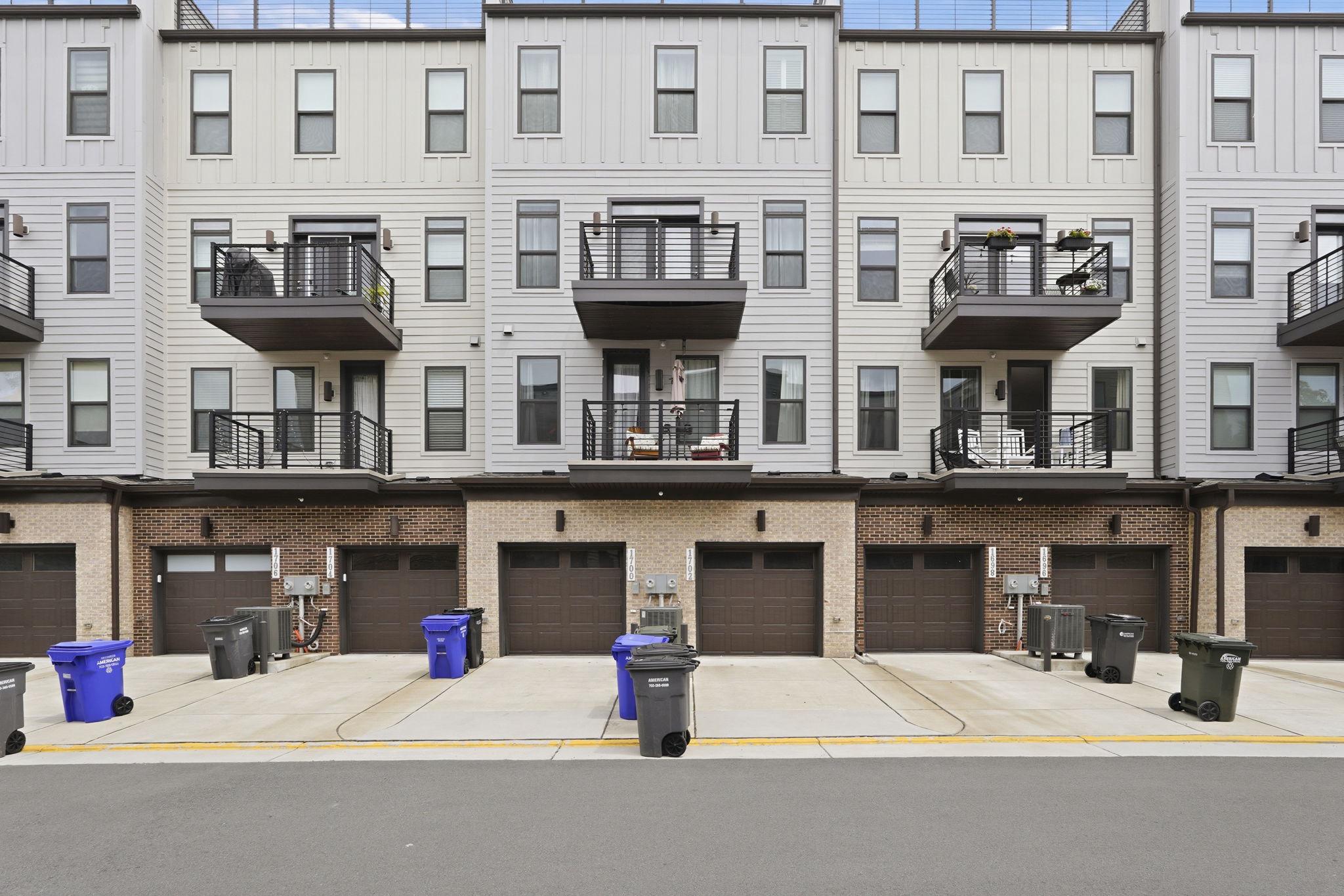 1702 Bandit Loop, Unit 19B Reston, VA 20190 - Photo 28 of 31 Garage and driveway.