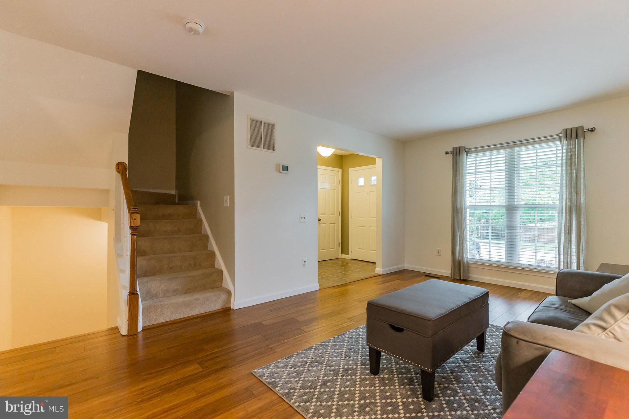 4436 Cole Farm Road Baltimore, MD 21236 - Photo 7 of 30 a living room with furniture and a window
