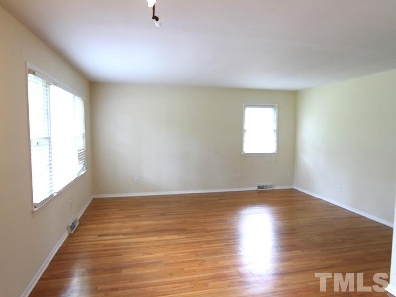 4609 Revere Road Durham, NC 27713 - Photo 2 of 12 a view of an empty room and window