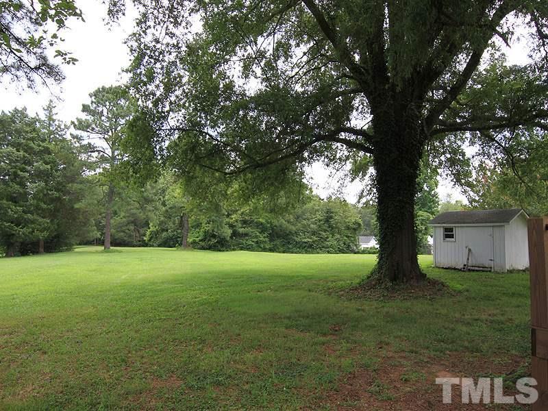 4609 Revere Road Durham, NC 27713 - Photo 11 of 12 a view of an outdoor space and a yard