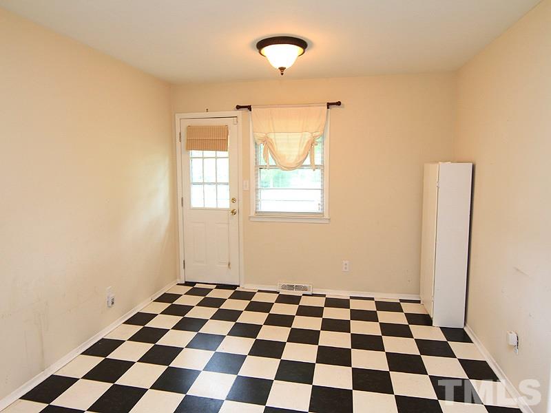 4609 Revere Road Durham, NC 27713 - Photo 5 of 12 a black and white checkered floor