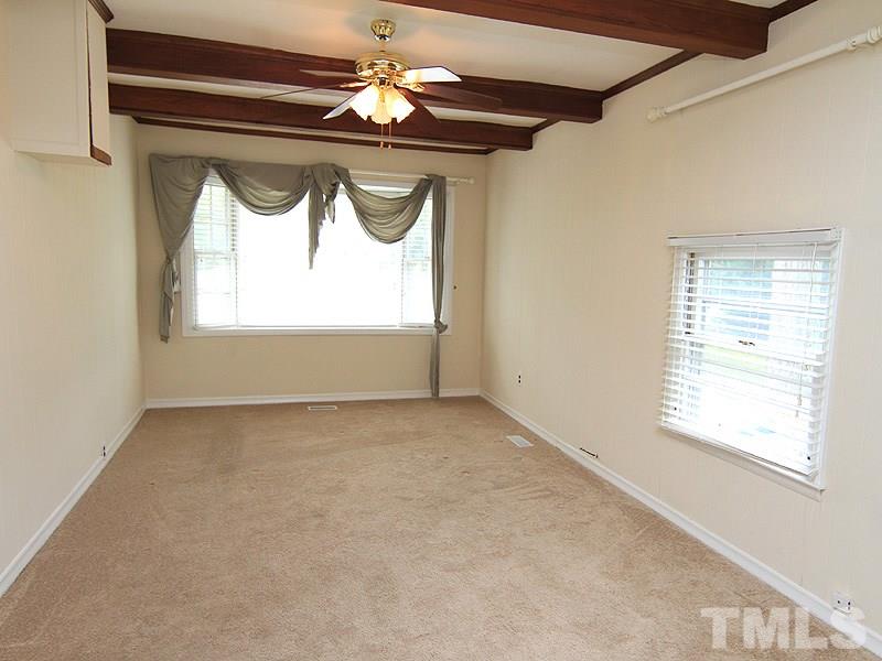 4609 Revere Road Durham, NC 27713 - Photo 6 of 12 a view of a ceiling fan and a window