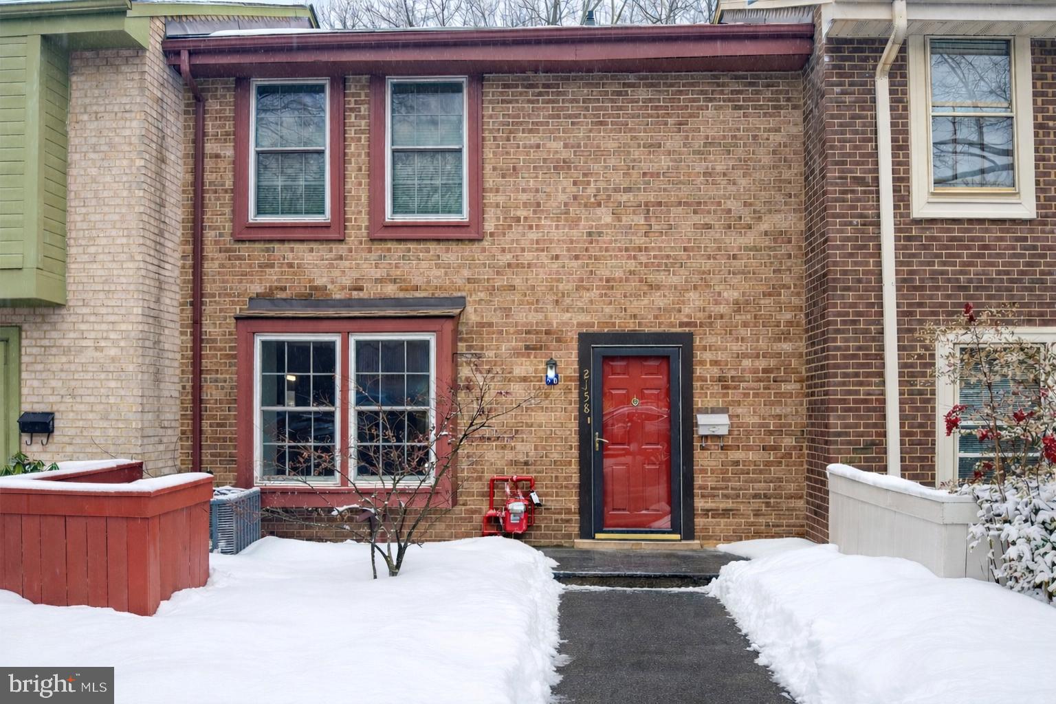 2158 Golf Course Drive Reston, VA 20191 - Photo 1 of 35 a building outdoor space with a couch