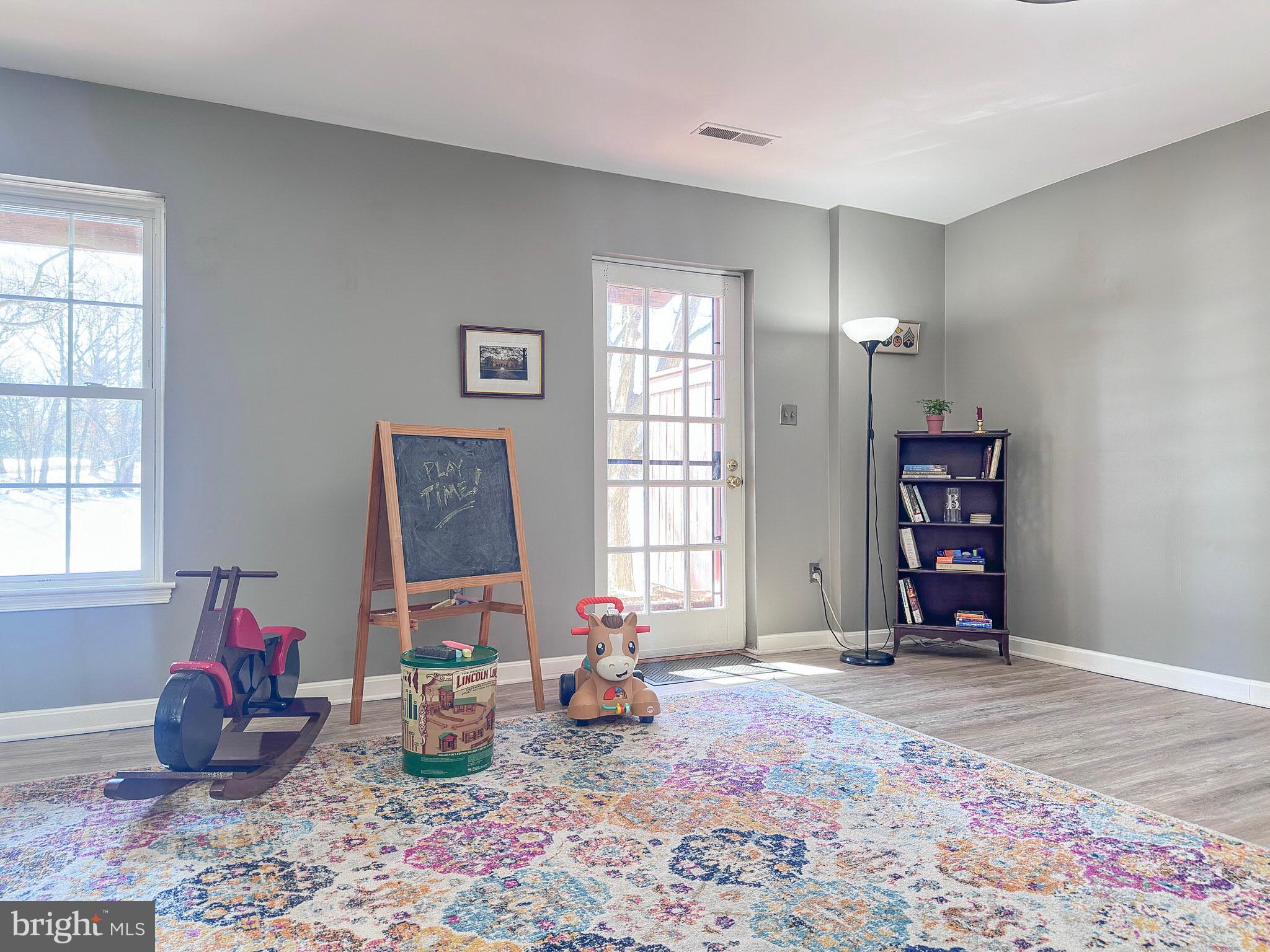 2158 Golf Course Drive Reston, VA 20191 - Photo 20 of 35 a living room with furniture and window