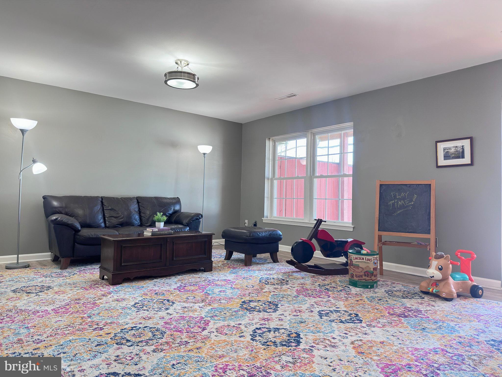 2158 Golf Course Drive Reston, VA 20191 - Photo 22 of 35 a living room with furniture window and piano
