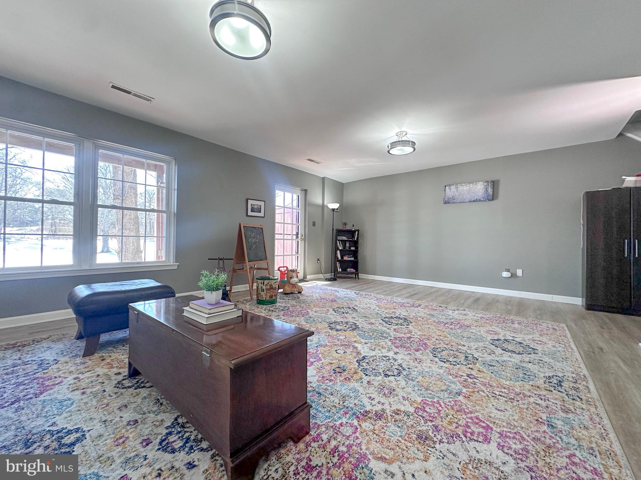 2158 Golf Course Drive Reston, VA 20191 - Photo 24 of 35 a living room with furniture and a large window