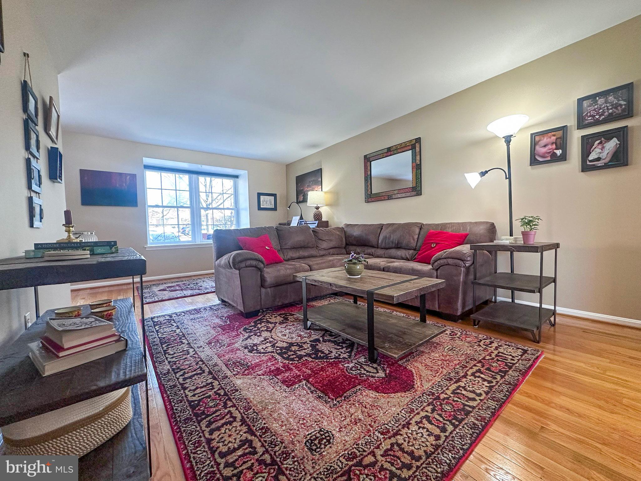 2158 Golf Course Drive Reston, VA 20191 - Photo 3 of 35 a living room with furniture rug and window