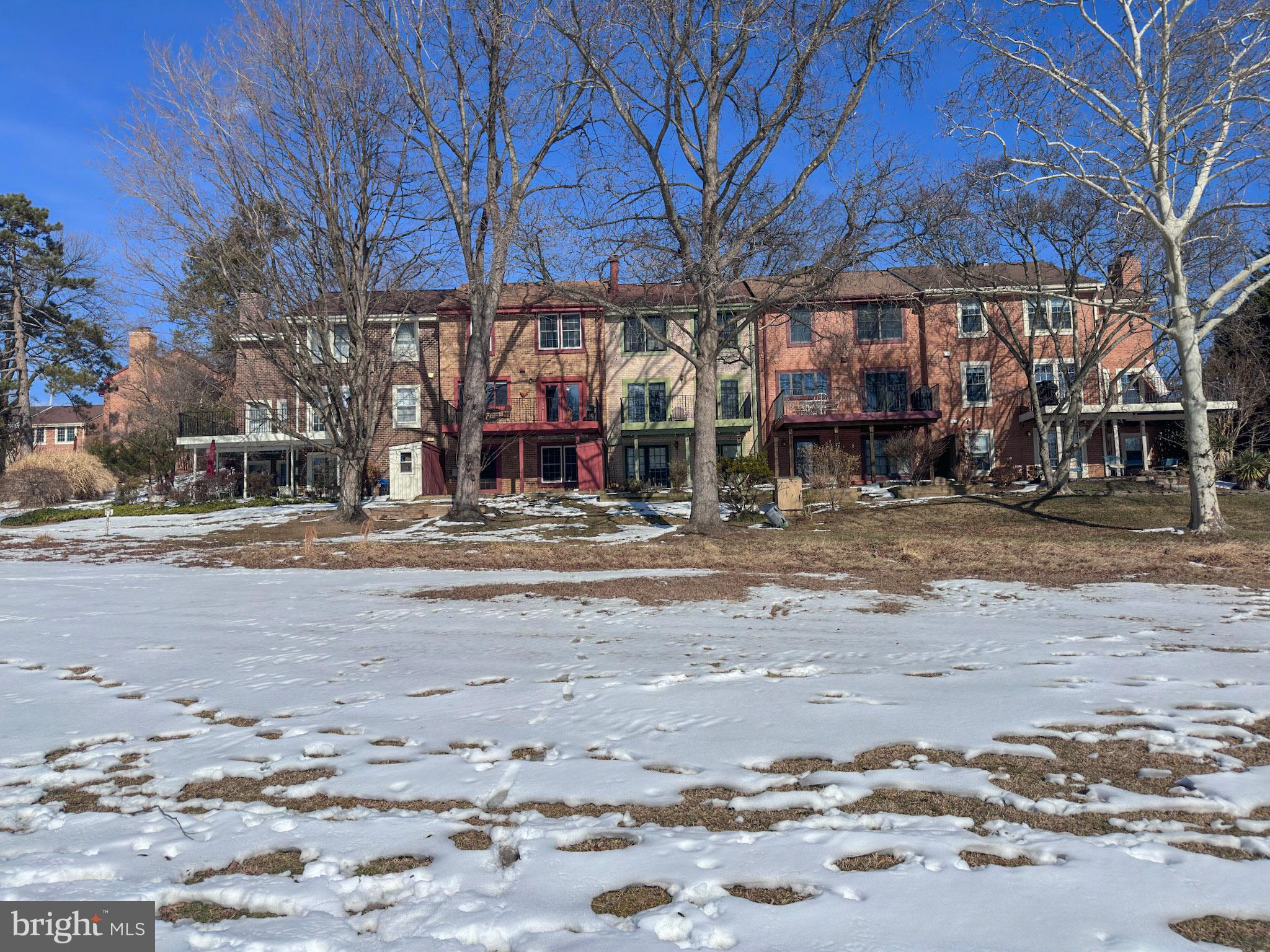 2158 Golf Course Drive Reston, VA 20191 - Photo 34 of 35 a building with trees in front of it