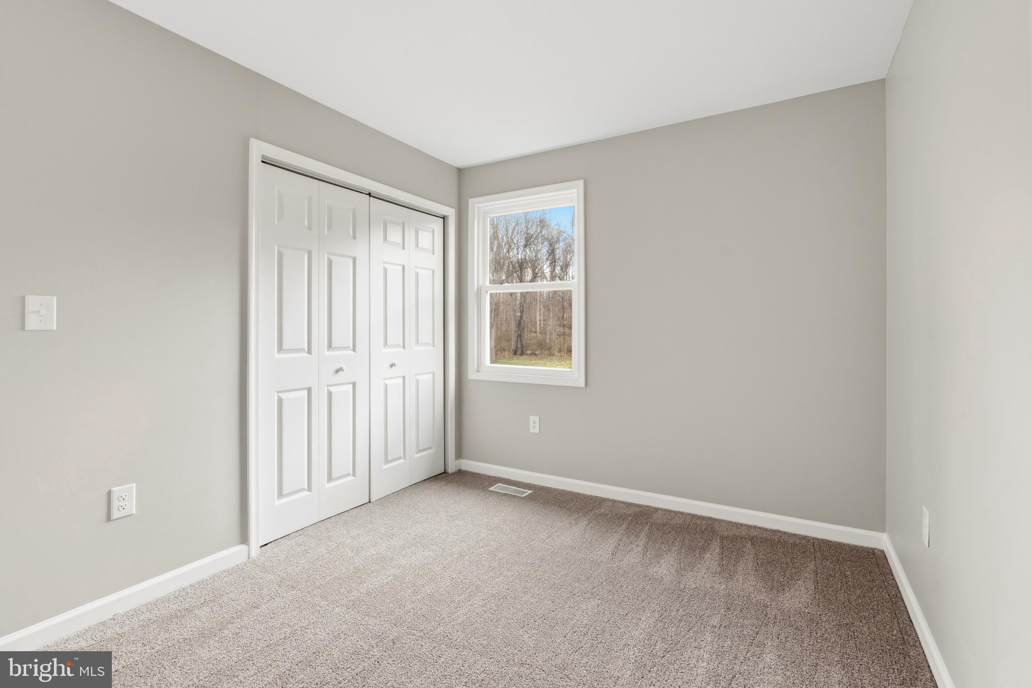 404 Weeping Willow Road Falling Waters, WV 25419 - Photo 14 of 24 a view of an empty room with a window
