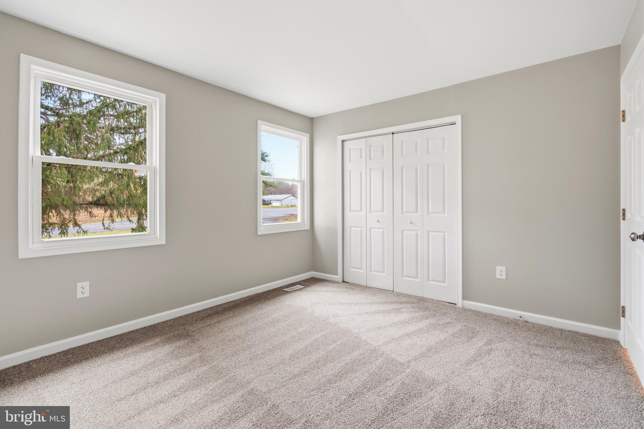 404 Weeping Willow Road Falling Waters, WV 25419 - Photo 15 of 24 an empty room with windows