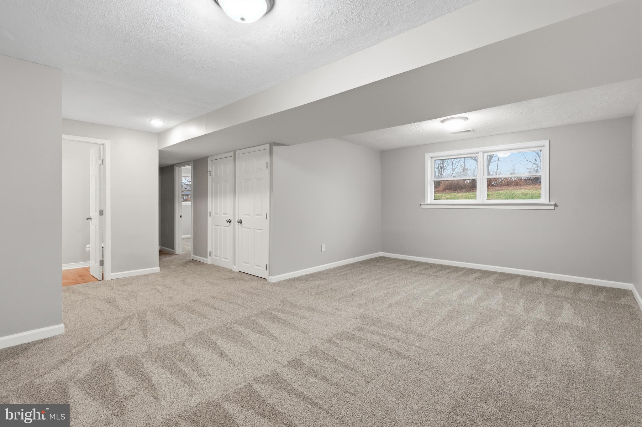 404 Weeping Willow Road Falling Waters, WV 25419 - Photo 18 of 24 a view of an empty room with a window