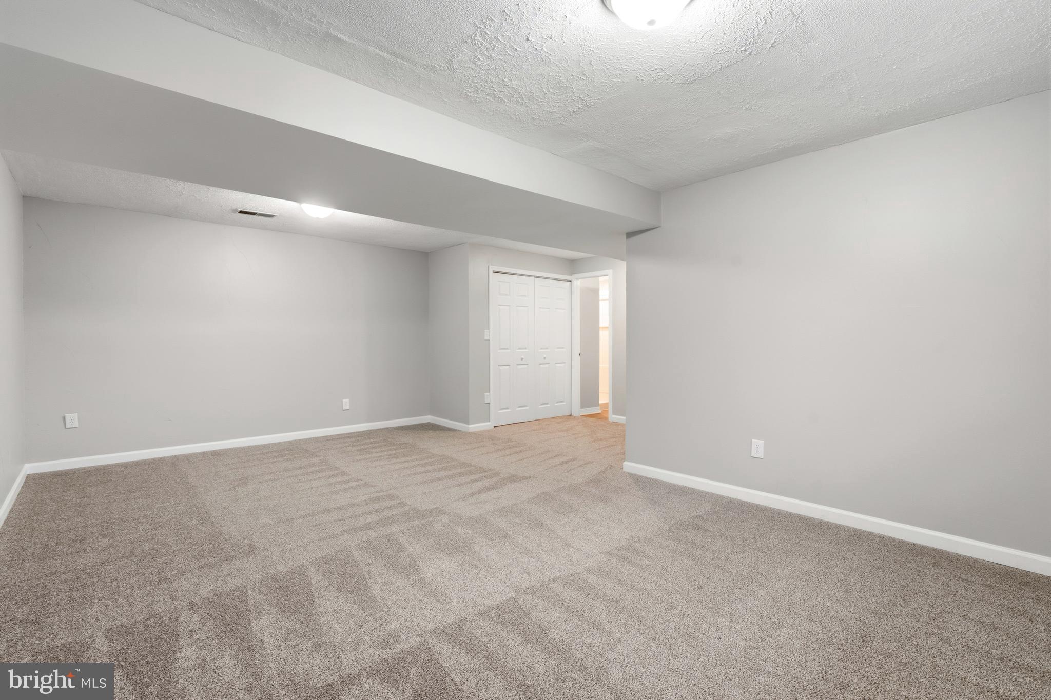 404 Weeping Willow Road Falling Waters, WV 25419 - Photo 19 of 24 a view of an empty room with a window