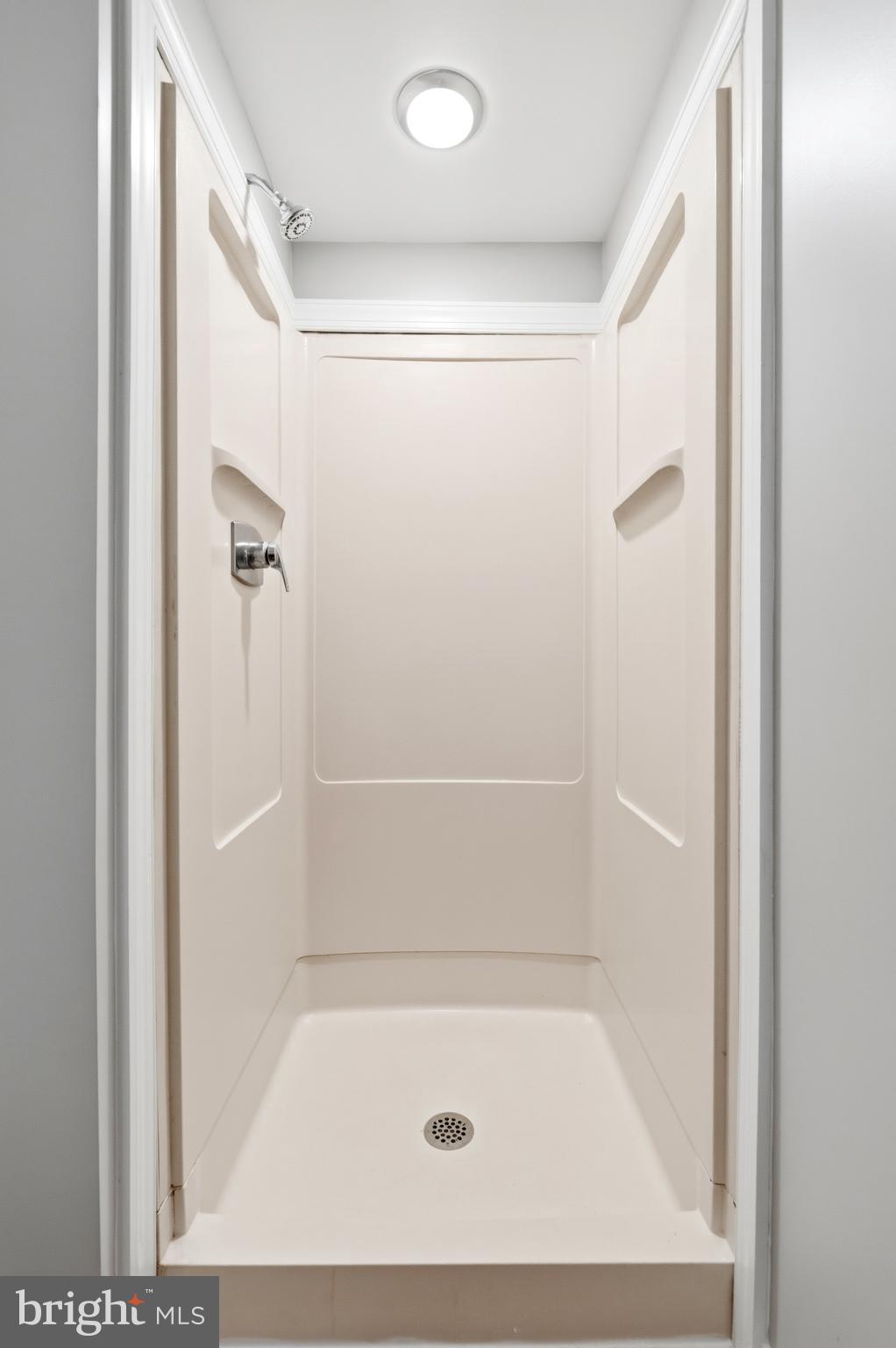 404 Weeping Willow Road Falling Waters, WV 25419 - Photo 21 of 24 a bathroom with a bath tub