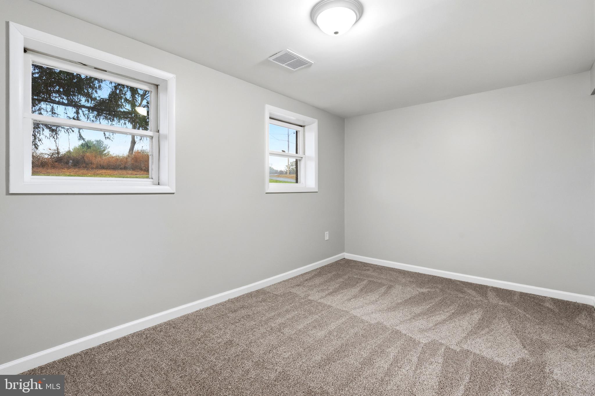 404 Weeping Willow Road Falling Waters, WV 25419 - Photo 23 of 24 a view of room with window and ceiling fan