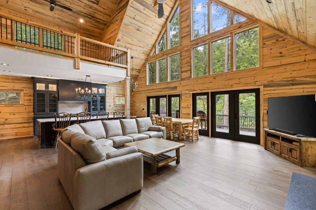 46 Rivers End Way Suches, GA 30572 - Photo 11 of 76 a living room with furniture and a flat screen tv
