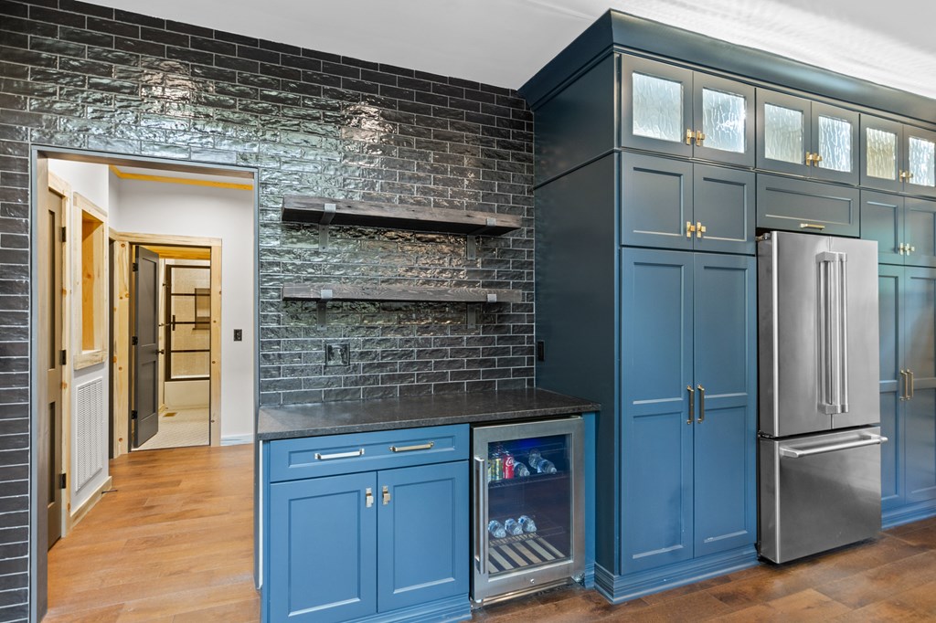 46 Rivers End Way Suches, GA 30572 - Photo 12 of 76 a kitchen with stainless steel appliances granite countertop a refrigerator and a wooden cabinets