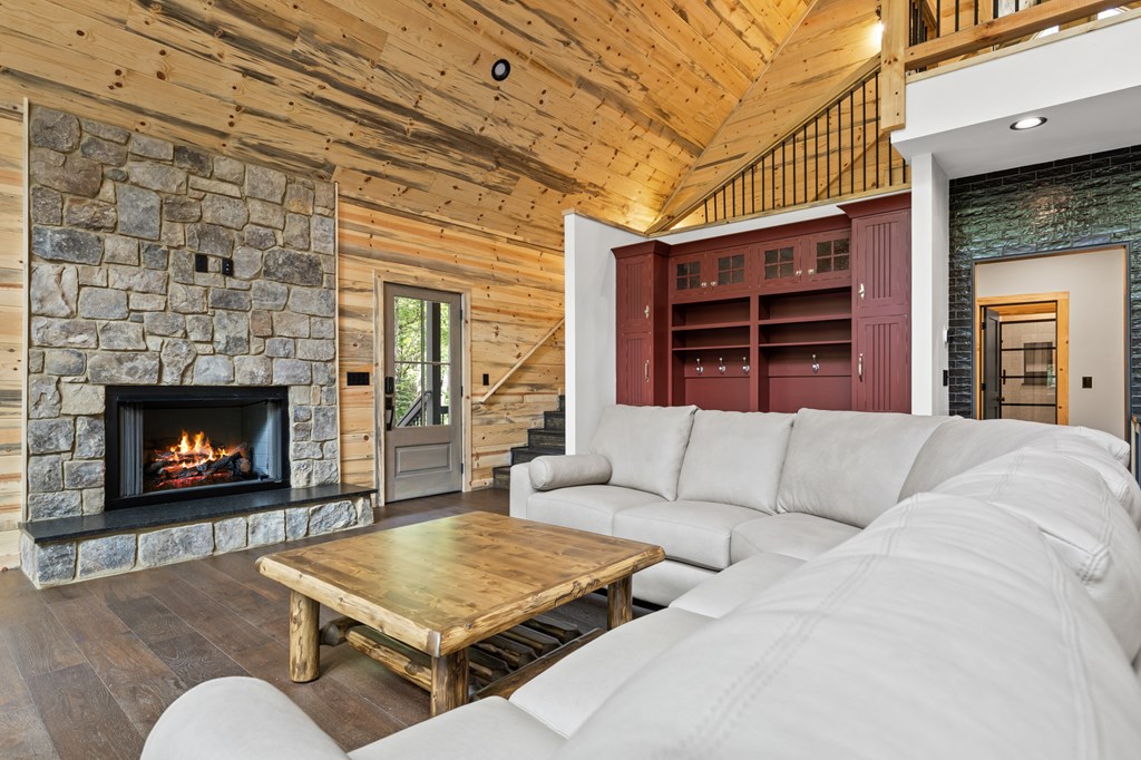 46 Rivers End Way Suches, GA 30572 - Photo 18 of 76 a living room with furniture and a fireplace