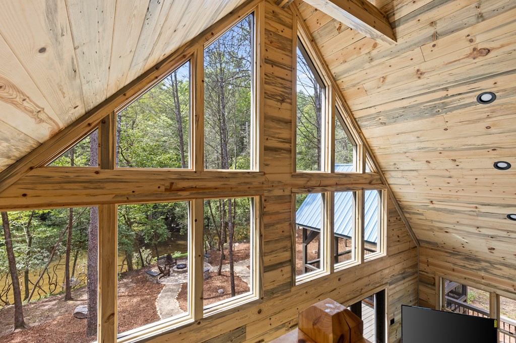46 Rivers End Way Suches, GA 30572 - Photo 28 of 76 a view of a balcony with wooden floor and iron stairs
