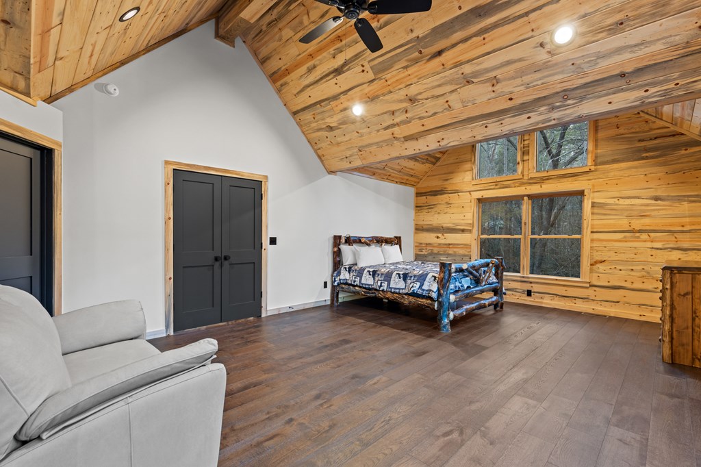 46 Rivers End Way Suches, GA 30572 - Photo 31 of 76 a living room with furniture and a chandelier