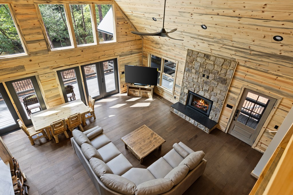 46 Rivers End Way Suches, GA 30572 - Photo 33 of 76 a living room with furniture and a fireplace