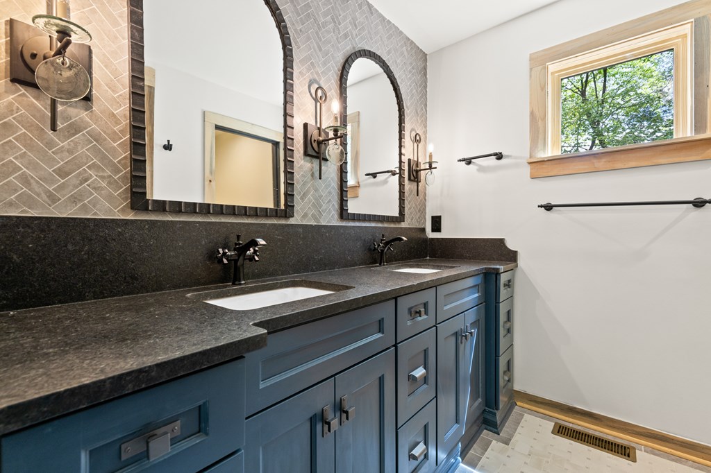 46 Rivers End Way Suches, GA 30572 - Photo 34 of 76 a bathroom with a granite countertop sink a mirror and a window