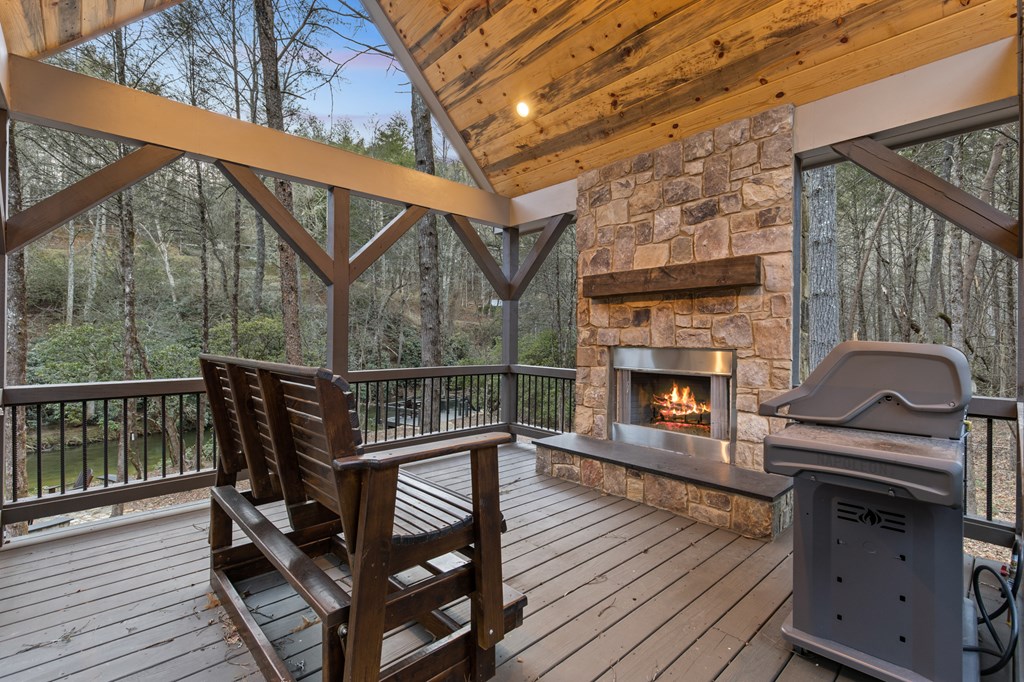 46 Rivers End Way Suches, GA 30572 - Photo 63 of 76 a view of a balcony with two chairs and wooden floor