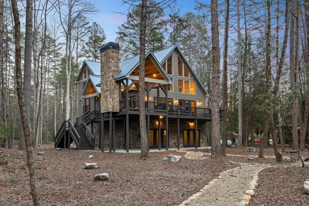 46 Rivers End Way Suches, GA 30572 - Photo 71 of 76 a view of a house with a yard and large trees