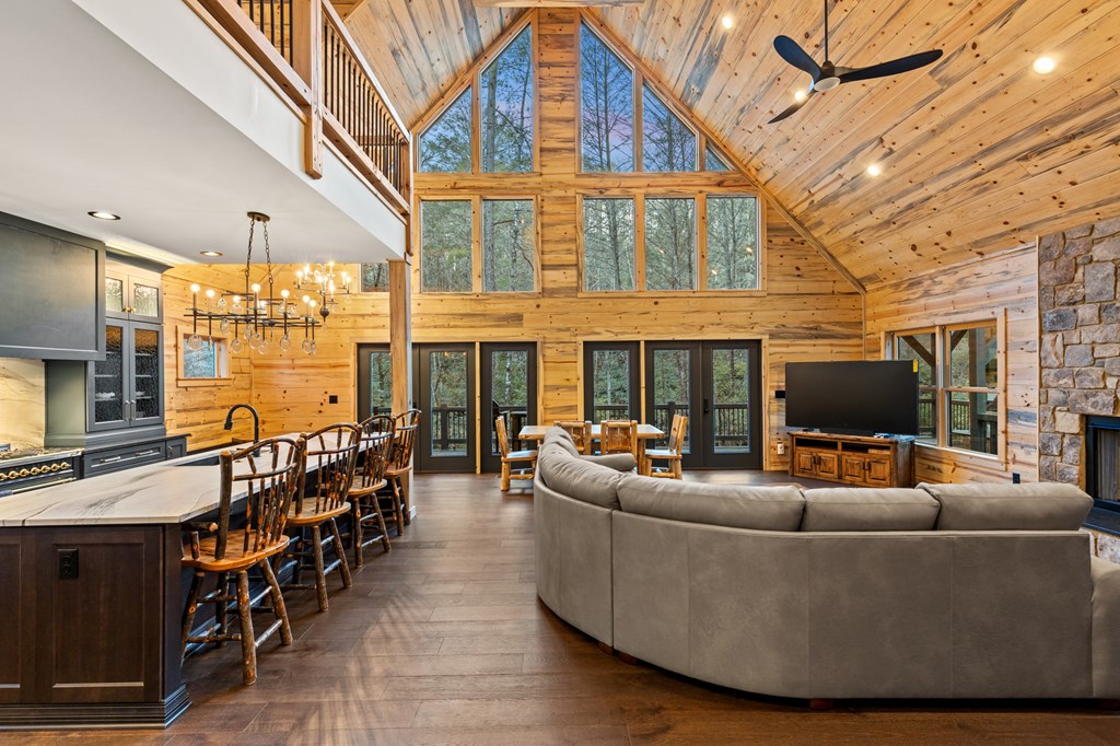 46 Rivers End Way Suches, GA 30572 - Photo 10 of 76 a living room with fireplace furniture and a large window