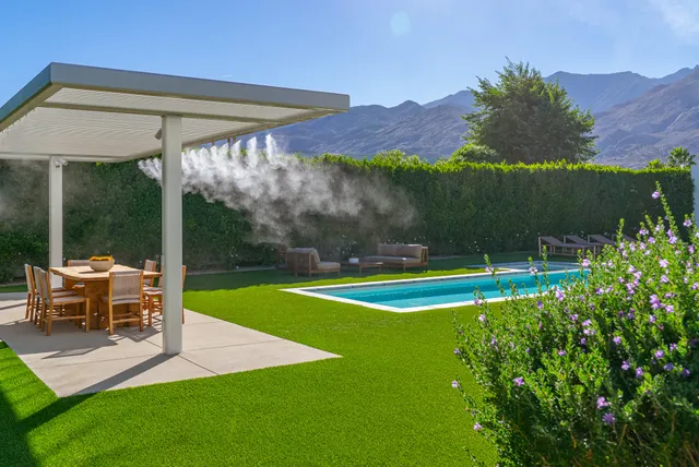 a view of a house with a swimming pool