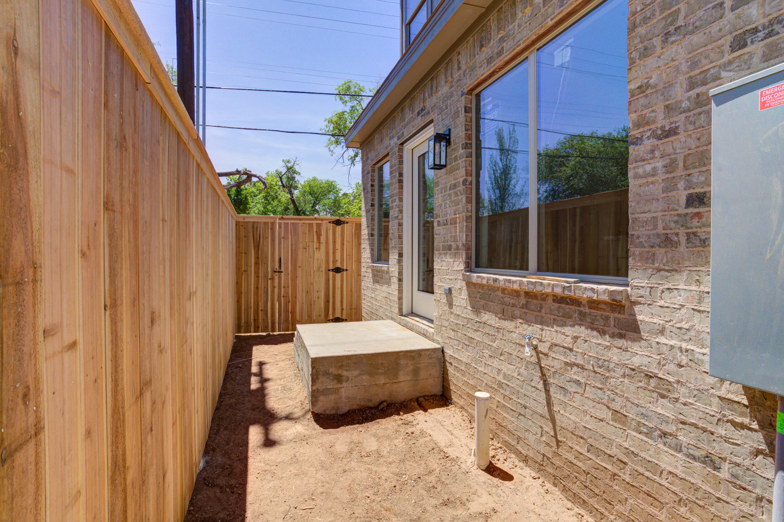 3425 24th Street Lubbock, TX 79410 - Photo 42 of 45 a bedroom with a bed and a window