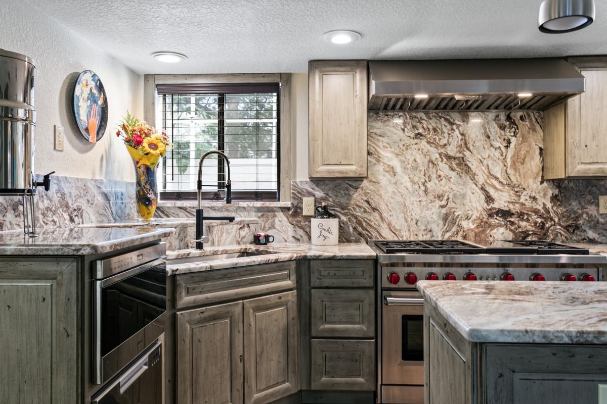 4 Santa Maria Lane St. Augustine, FL 32080 - Photo 14 of 35 a kitchen with stainless steel appliances granite countertop a sink and a stove